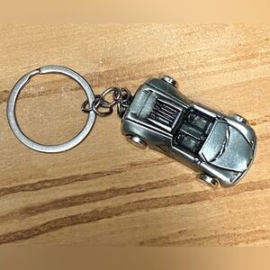 Silver convertible car key chain.